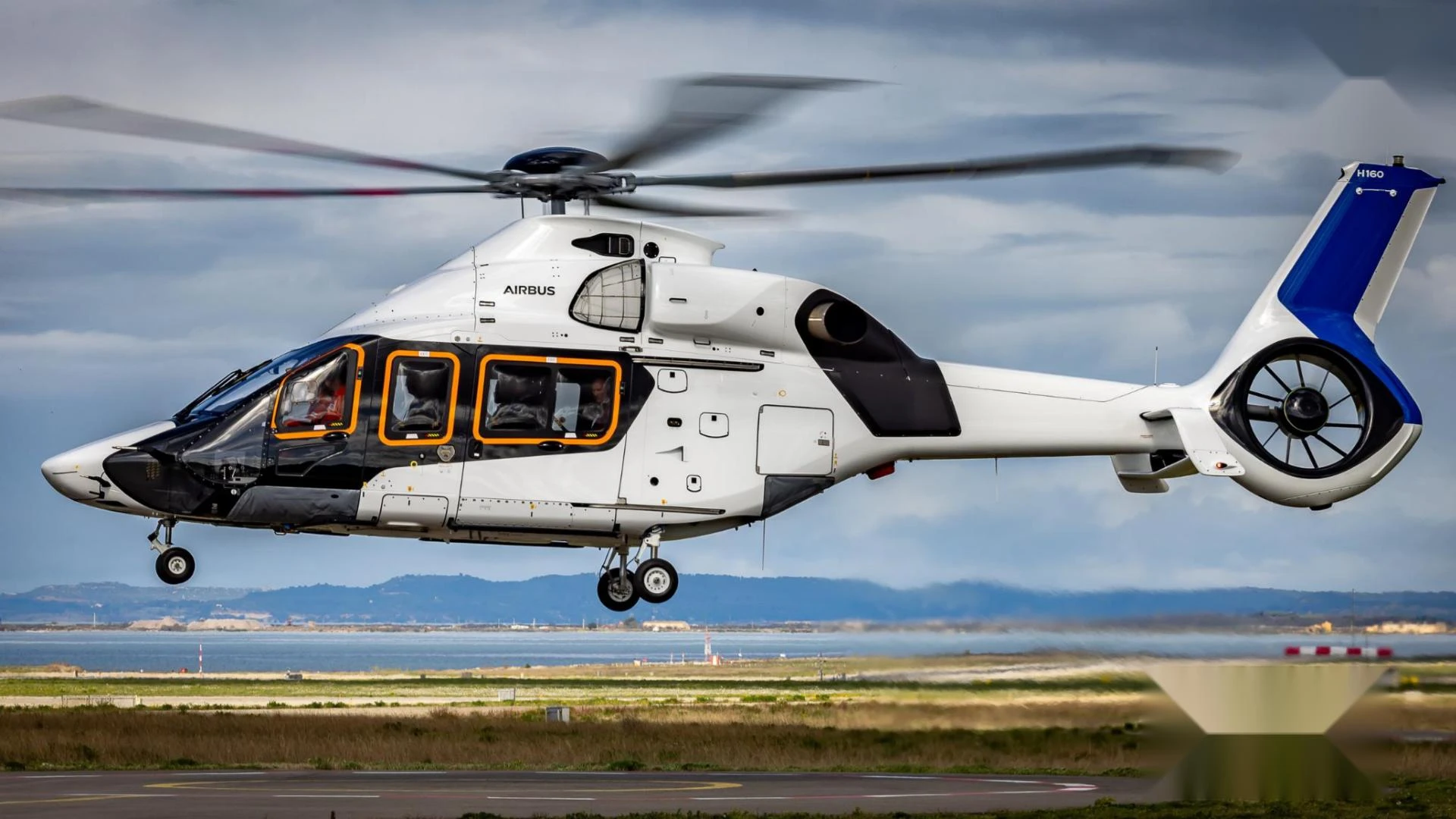 An H160 helicopter in flight