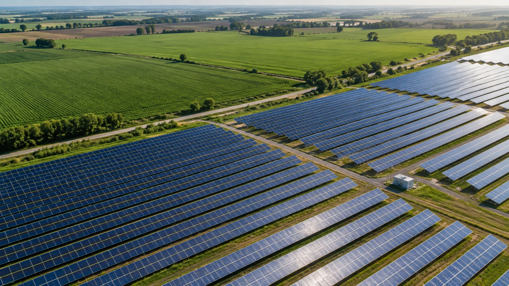 Concept aerial view of solar panels alongside cultivated fields